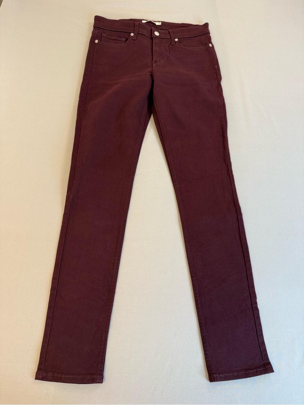 Levi’s 711 Skinny Jeans Burgundy Size 29 irregular (see measurements in photos)